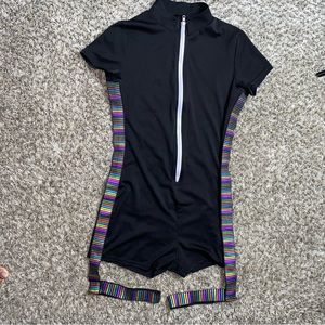 Jumpsuit with leg harnesses